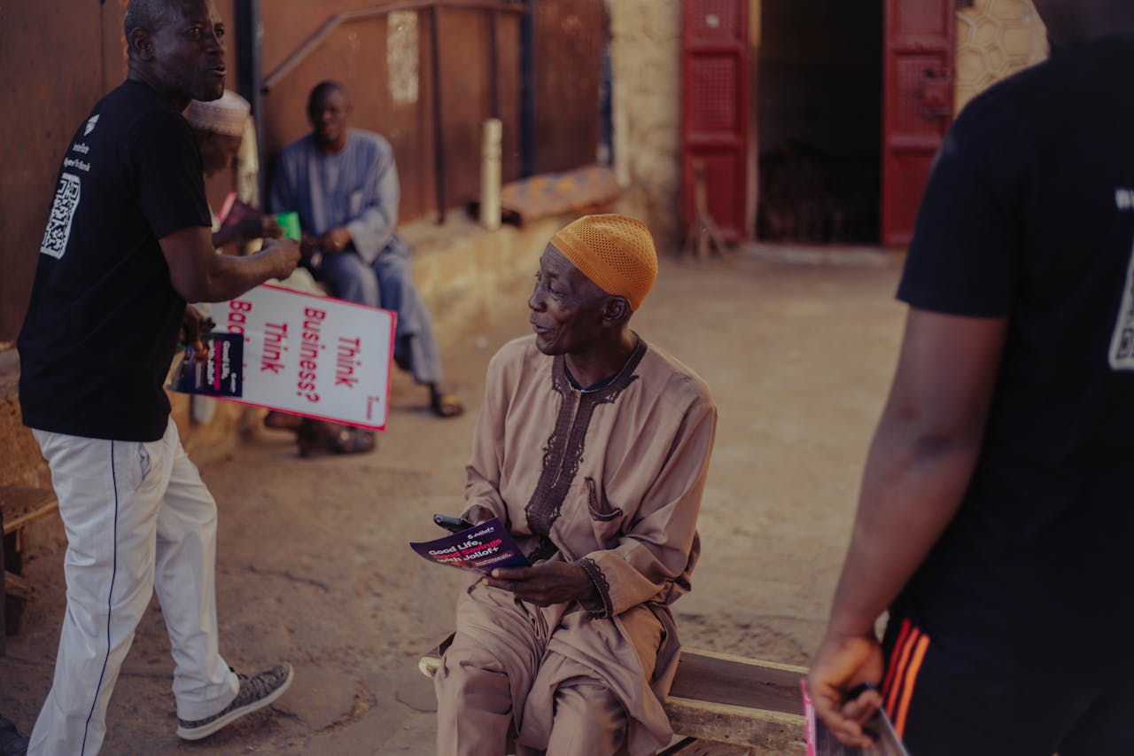 services-03 Local community engaging in business promotion with flyers and posters.